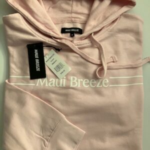 Folded pink Maui Breeze hoodie with tags